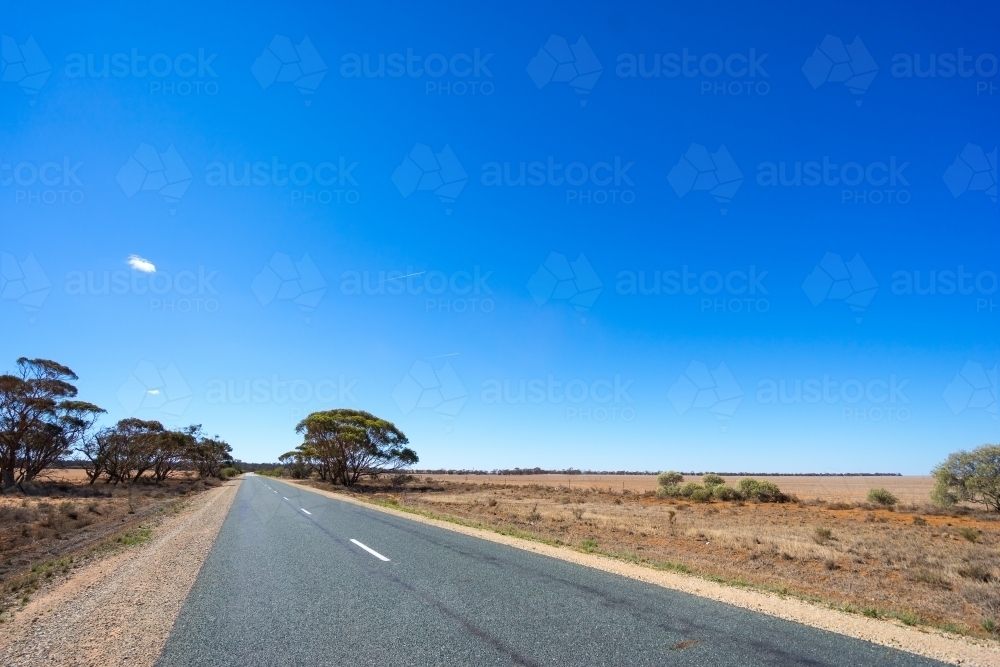 Country road and farm land - Australian Stock Image