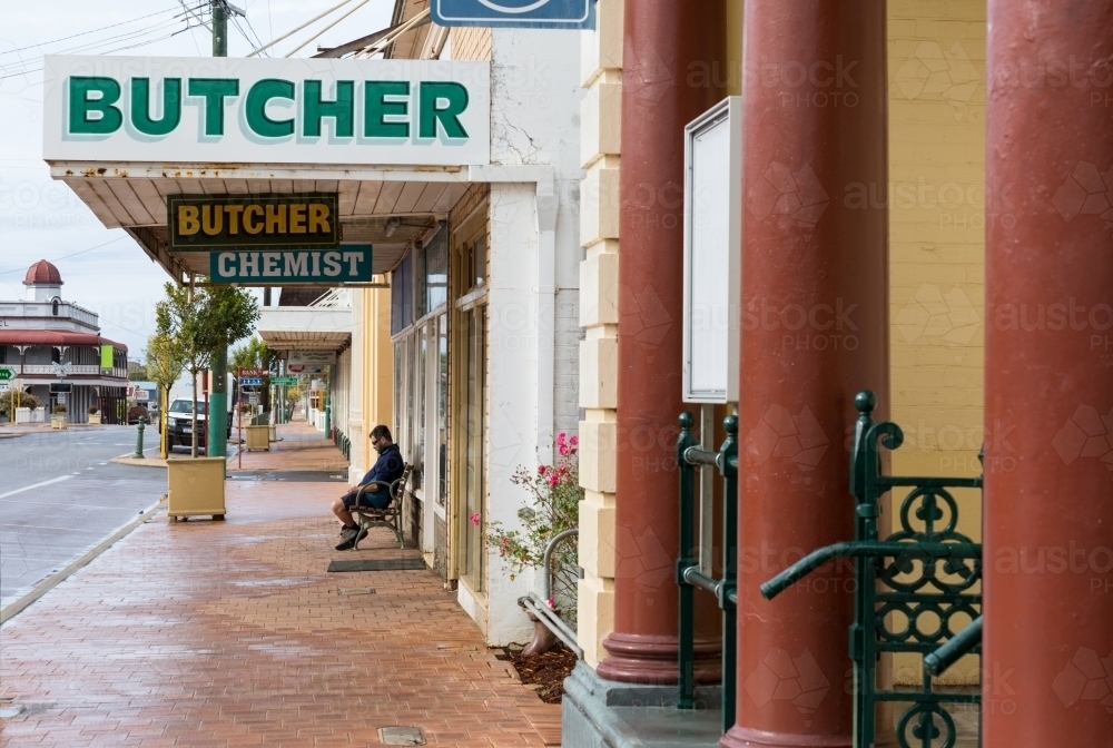 Image of Country town main street with butcher shop sign - Austockphoto