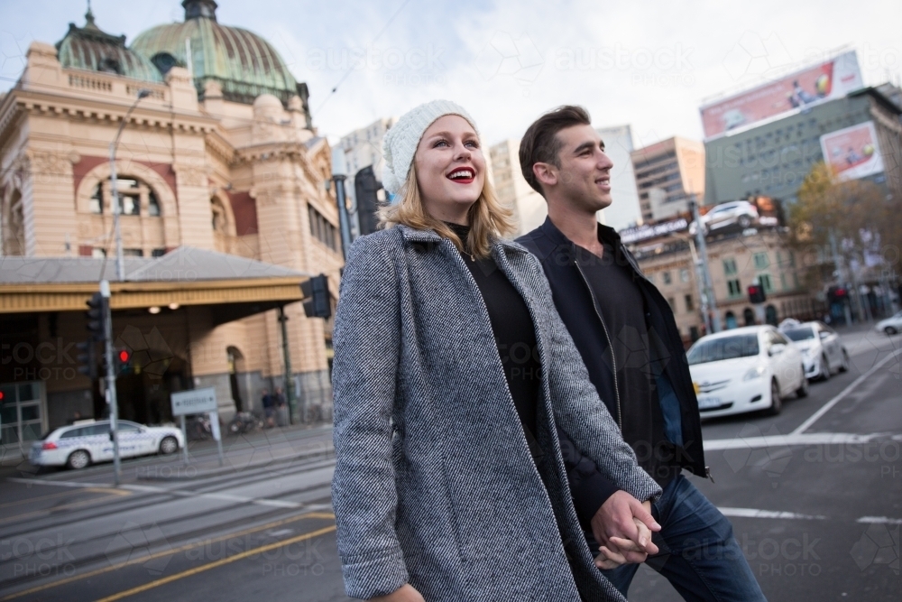 Couple Crossing to Federation Square - Australian Stock Image