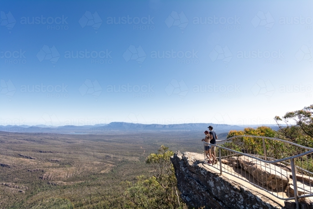 Couple enjoying the view at The Reeds Lookout, Grampians - Australian Stock Image