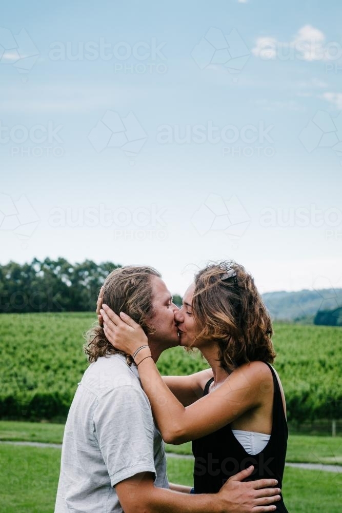 couple kissing at a winery - Australian Stock Image