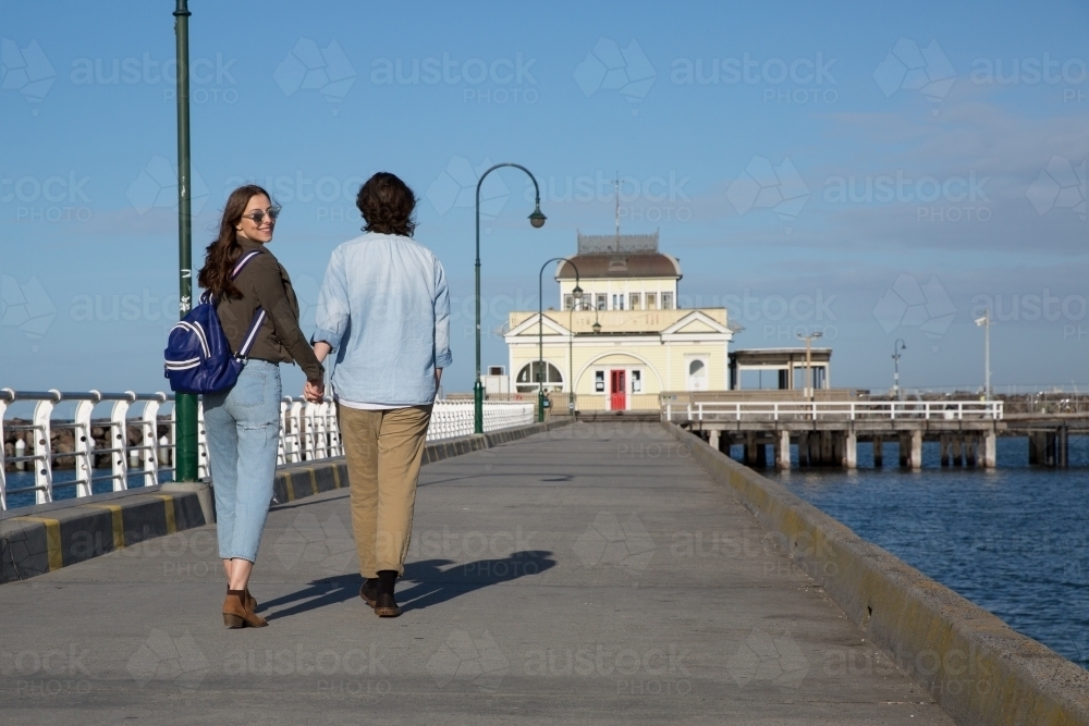 Couple Walking on St Kilda Pier - Australian Stock Image