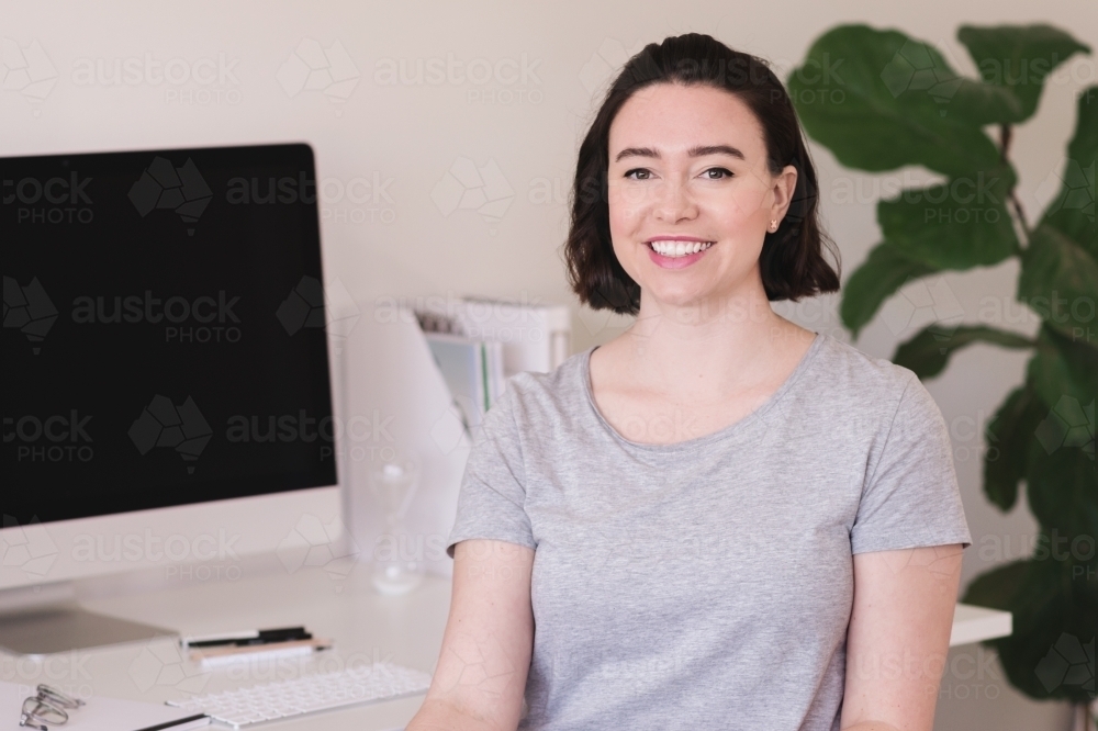 creative work at home woman in her office - Australian Stock Image