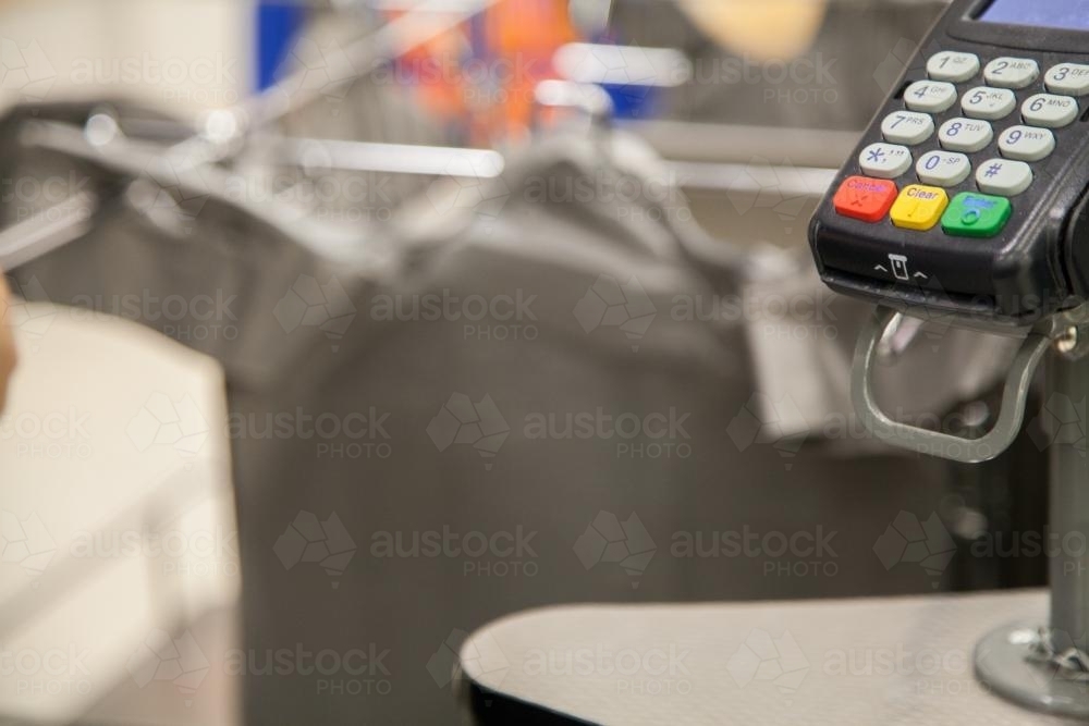 Credit card terminal at shopping centre with copy space - Australian Stock Image