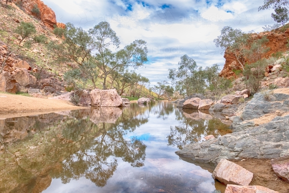 Creek and rocks in Simpsons Gap, Northern Territory - Australian Stock Image