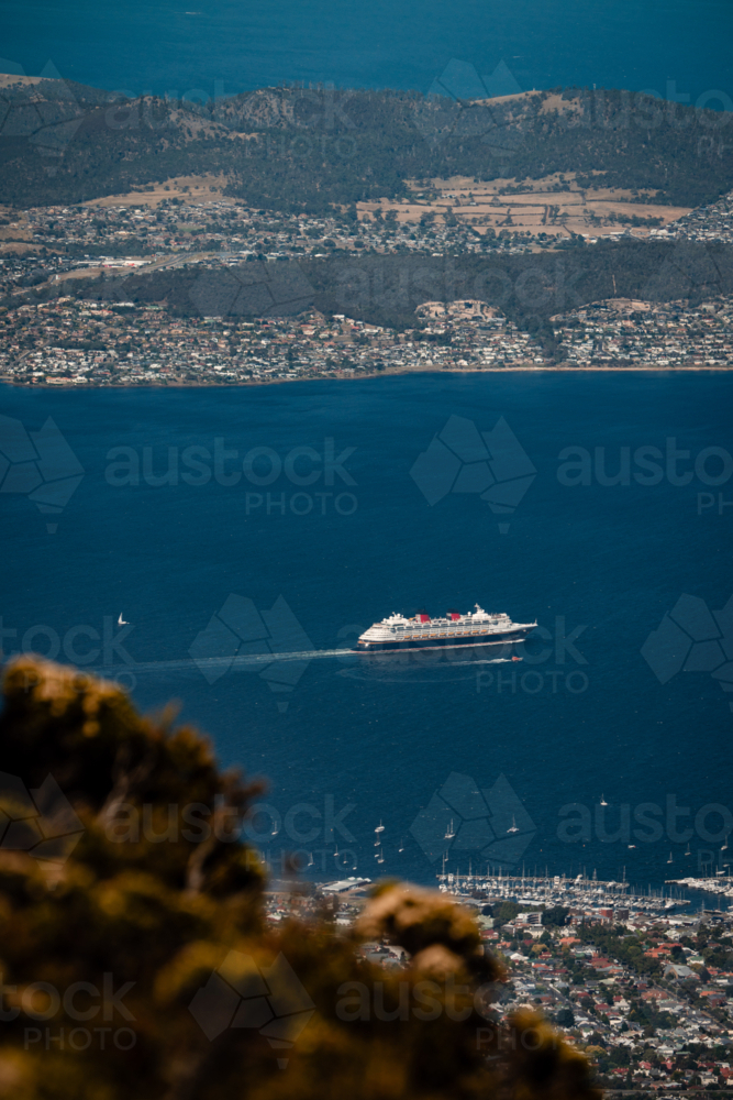 Cruise ship sailing through the deep blue ocean Tasmania, Australia - Australian Stock Image