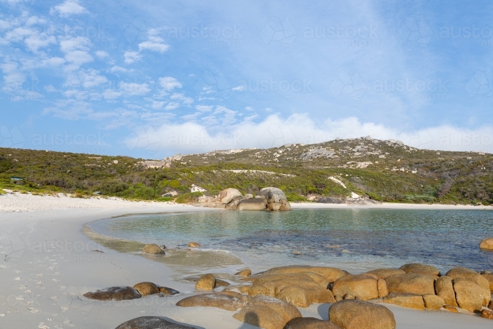 crystal clear water on quiet white sand beach on the south coast of WA - Australian Stock Image