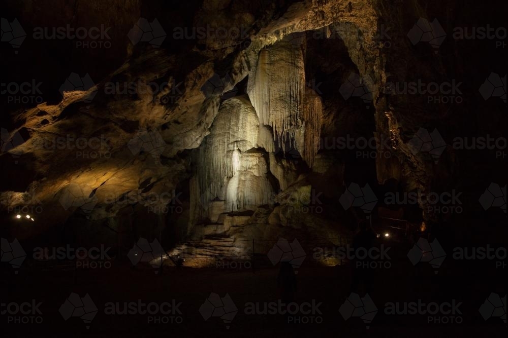 Crystal stalactite rock formation in Cathedral Cave at Wellington - Australian Stock Image