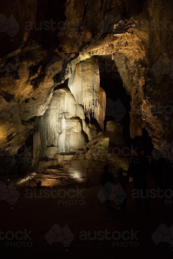 Crystal stalactite rock formation in Cathedral Cave at Wellington - Australian Stock Image