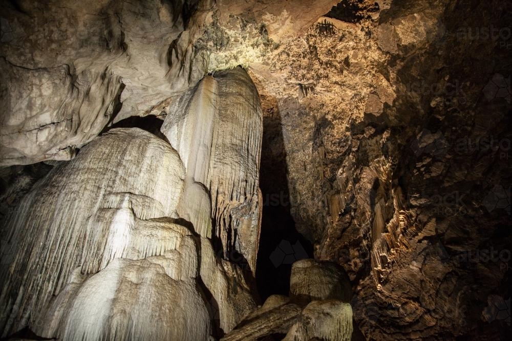 Crystal stalactite rock formation in Cathedral Cave at Wellington - Australian Stock Image