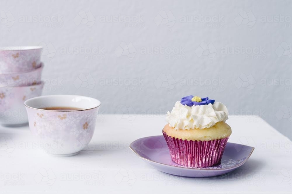 cupcake in purple theme - Australian Stock Image