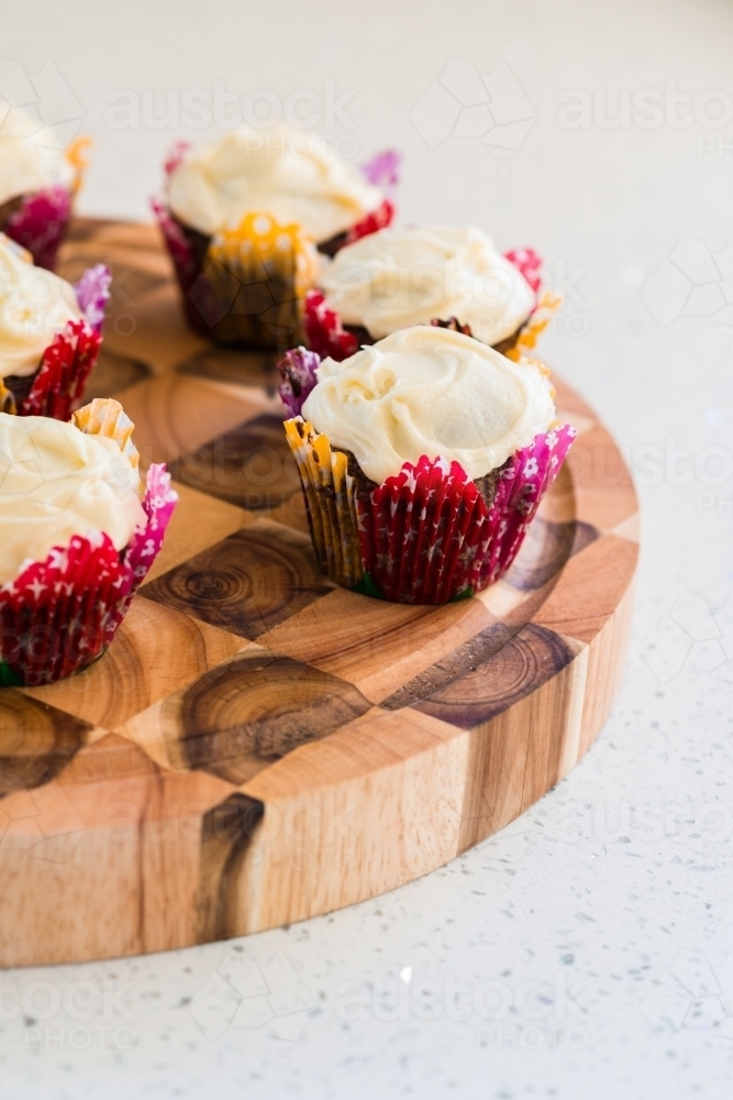 cupcakes with vanilla icing - Australian Stock Image