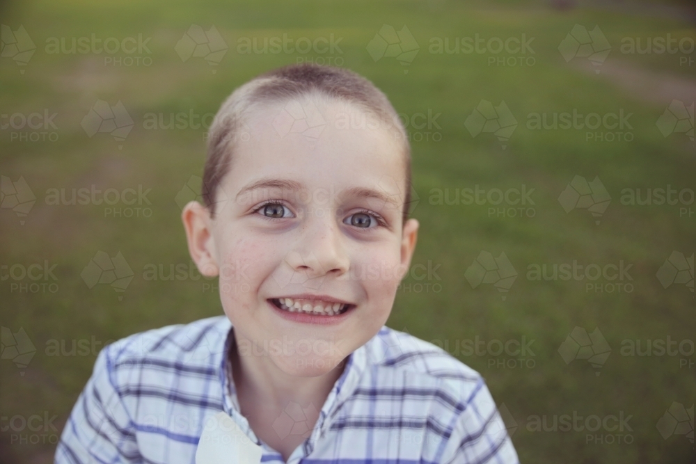 Cute young boy at the park - Australian Stock Image
