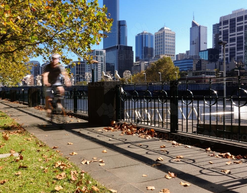 Cyclist on Banks of Yarra in Southbank - Australian Stock Image