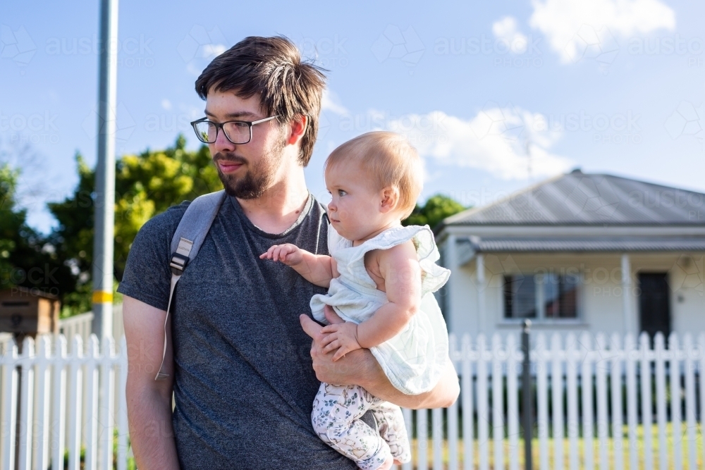 Image of Dad with baby out and about going to daycare Austockphoto