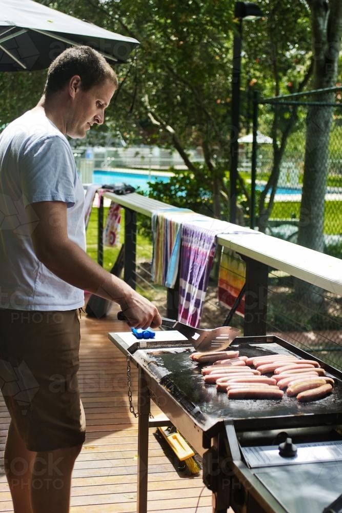 dad working the bbq - Australian Stock Image