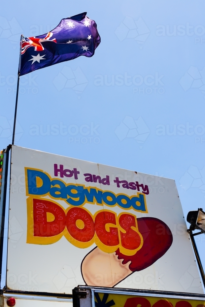 Dagwood dog sign and australian flag at a fair - Australian Stock Image