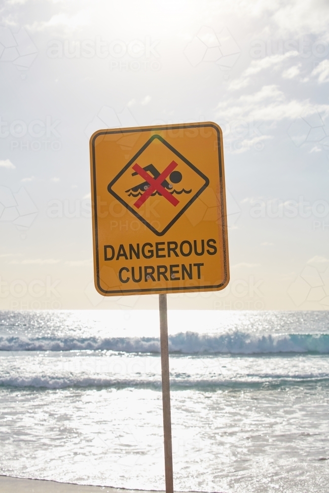 Dangerous current sign at beach - Australian Stock Image