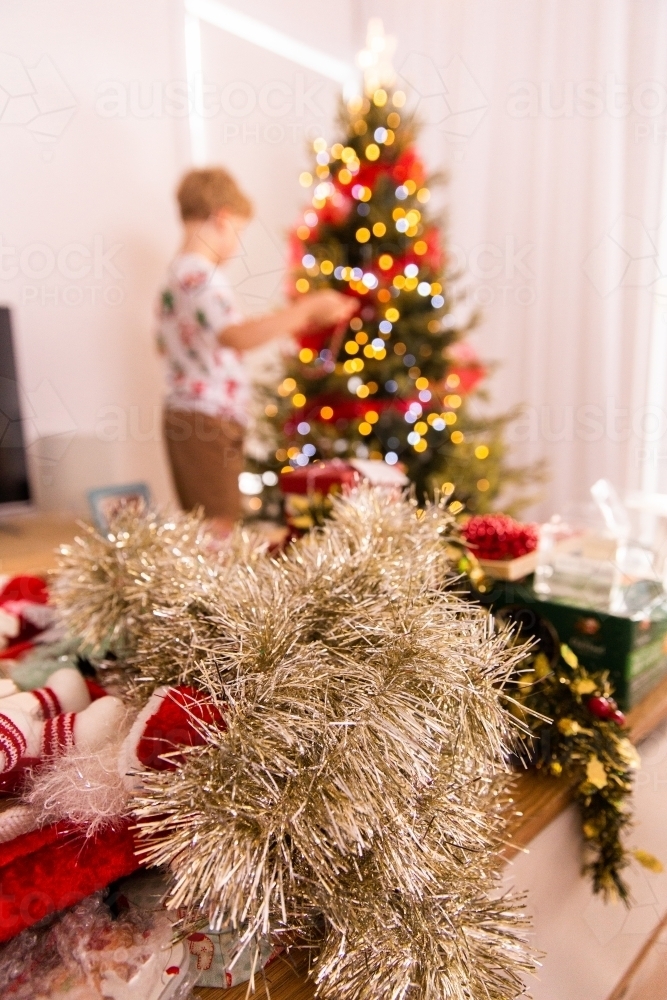 Image of decorating the christmas tree with kids Austockphoto