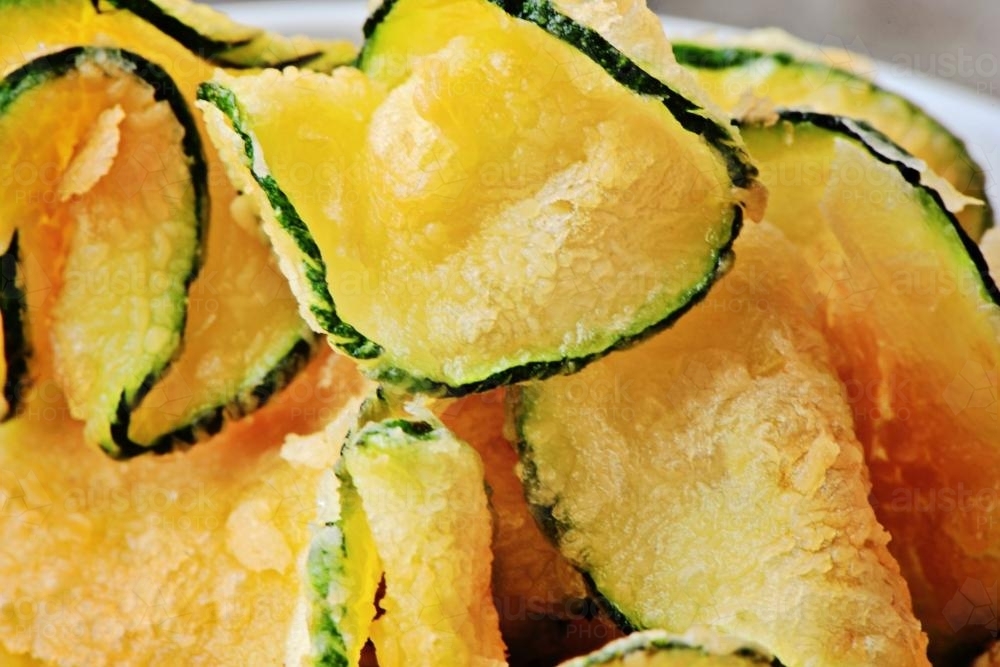 Image of deep fried zucchini chips Austockphoto