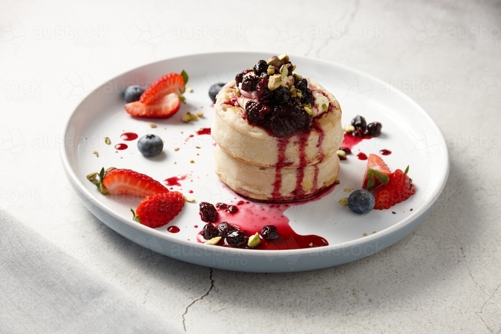 Delicious berry desert on plate - Australian Stock Image