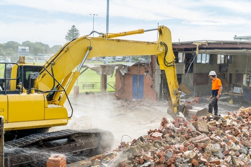 Image of Demolition machinery working on a construction site Austockphoto