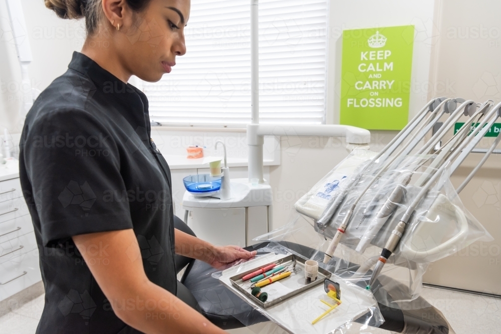 Dental Hygienist preparing for an appointment - Australian Stock Image