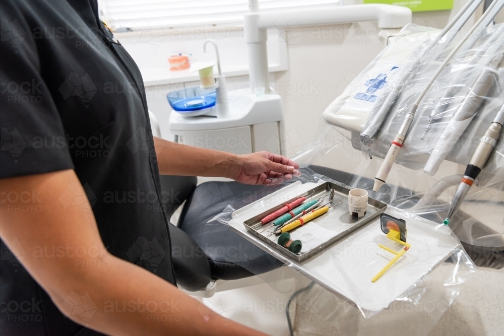 Dental Hygienist preparing for an appointment - Australian Stock Image