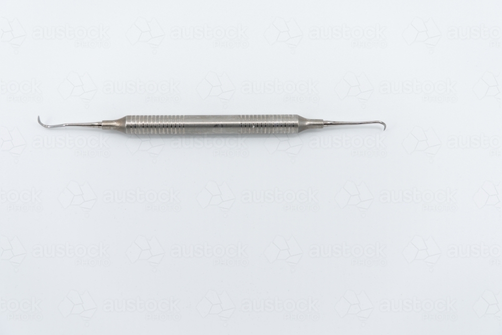 Dental scaler instrument - Australian Stock Image