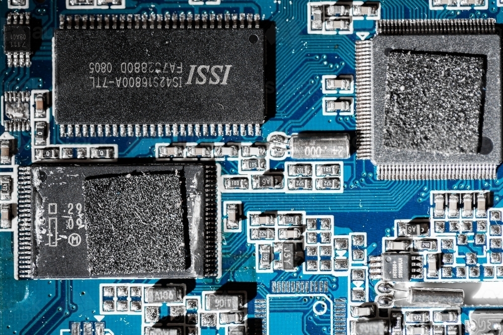 Detail of blue circuit board - Australian Stock Image