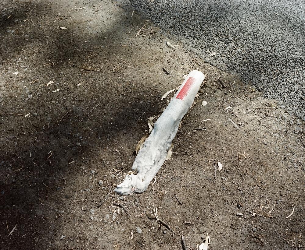 Detail of road marker melted by bushfire - Australian Stock Image