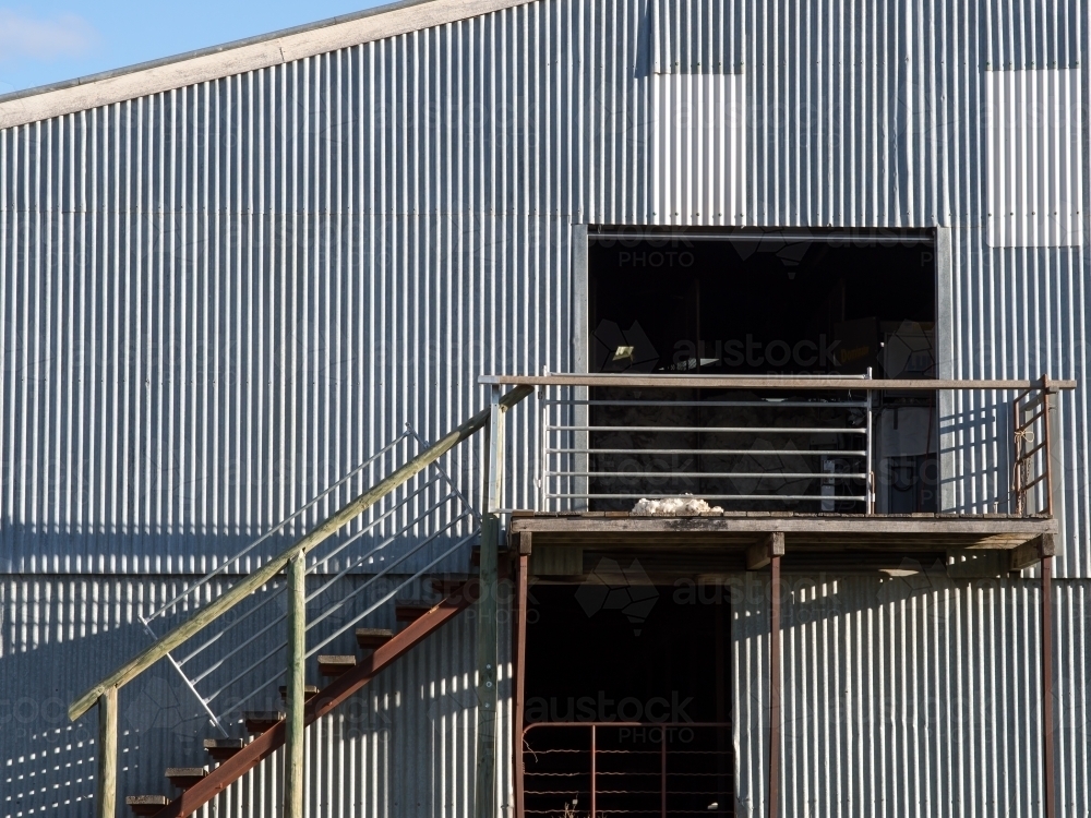 Detail of stairs to a corrugated iron shearing shed - Australian Stock Image