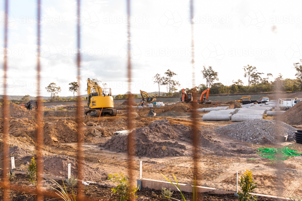 diggers and other earth moving equipment getting land ready for sale - Australian Stock Image