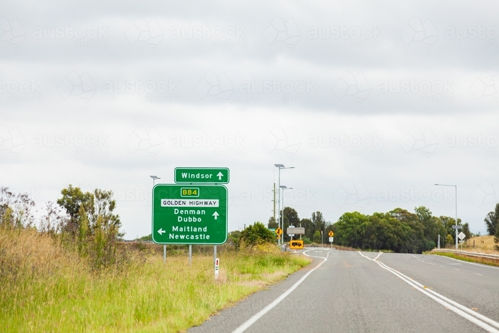 Image of Directions on road sign to Windsor , Denman or Dubbo on the