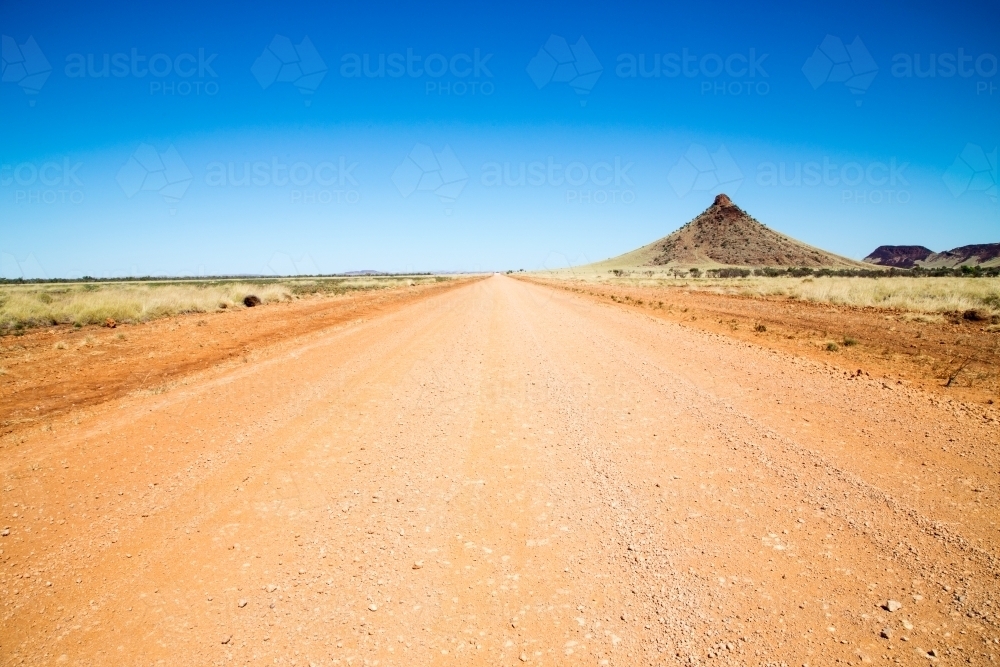 Dirt road disappearing into the distance - Australian Stock Image