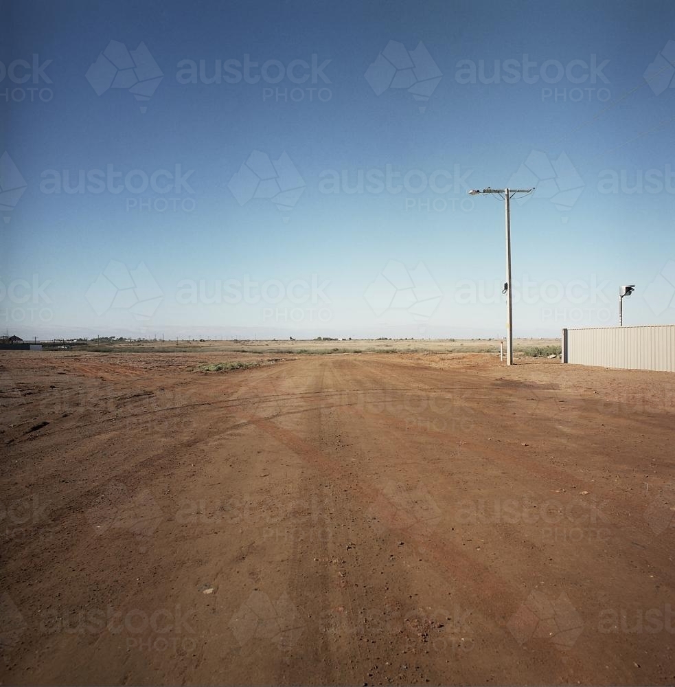 Dirt road in remote town leading to nowhere - Australian Stock Image