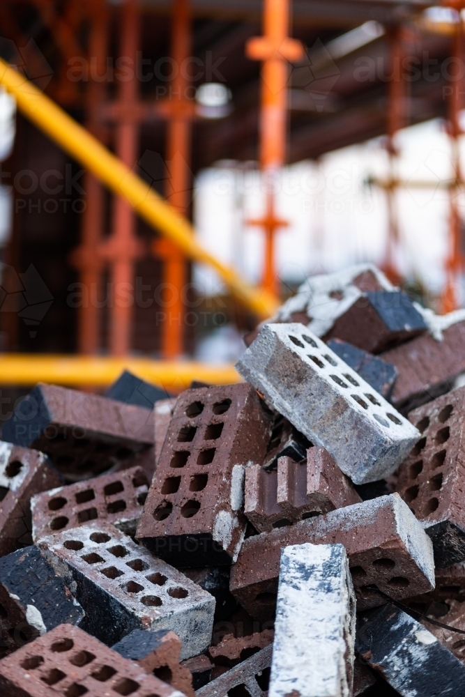 Image of Discarded bricks in pile on construction site - Austockphoto