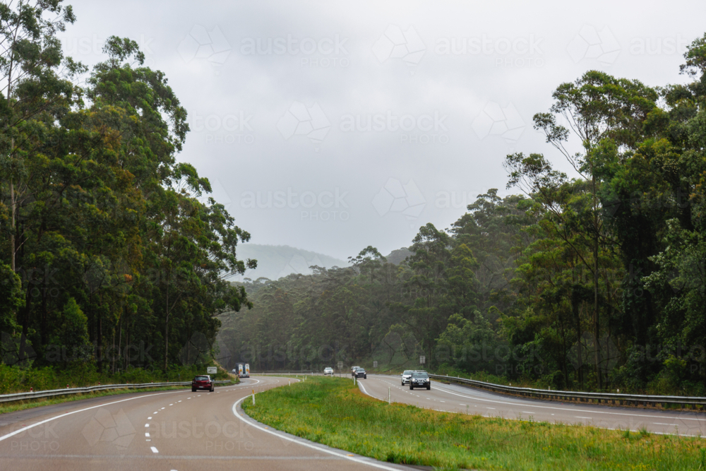 Divided highway on east coast of Australian in overcast rainy weather - Australian Stock Image