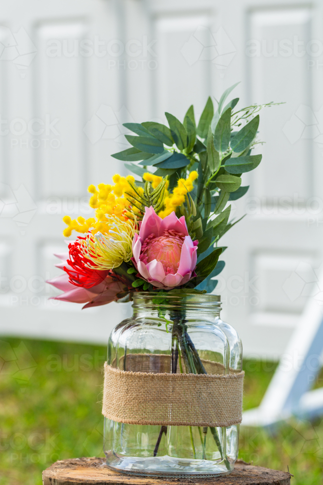 DIY cheap plastic wedding flowers of Australian natives at affordable wedding - Australian Stock Image
