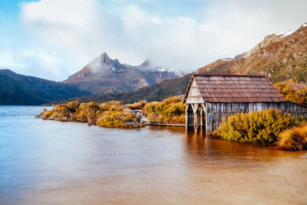 Dove Lake boatshed on an early winter morning in Cradle Mountain, Tasmania, Australia - Australian Stock Image