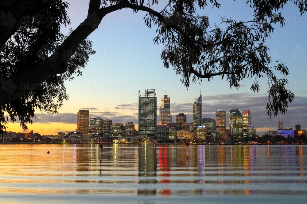 Downtown city lights of Perth CBD reflecting on the Swan River. - Australian Stock Image