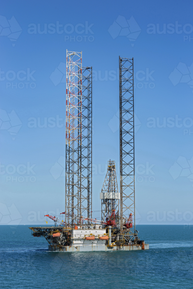 Drilling rig transfer at sea - Australian Stock Image