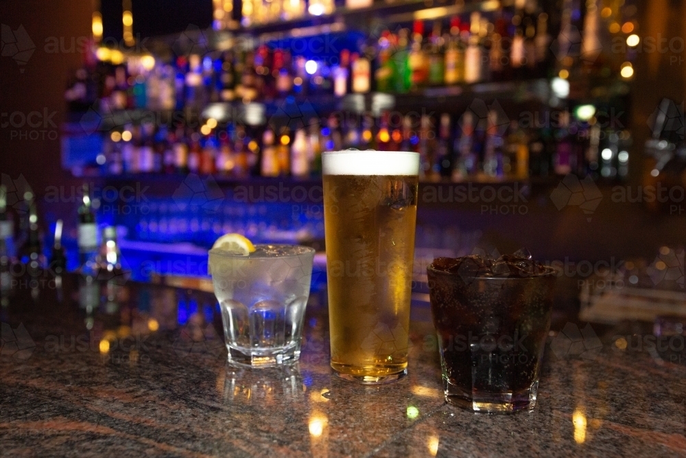 Drinks at nightclub bar - Australian Stock Image