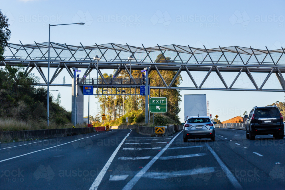 Auto Rd Point Image of Drivers point of view on toll road with exit and end toll ...