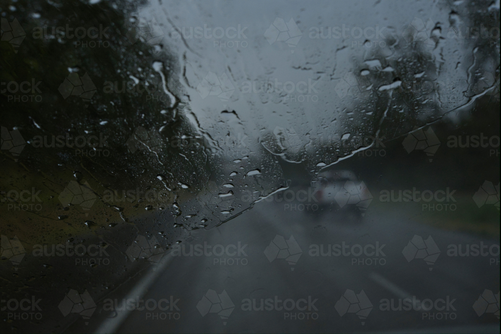 Driving in the rain, rain on windscreen - Australian Stock Image