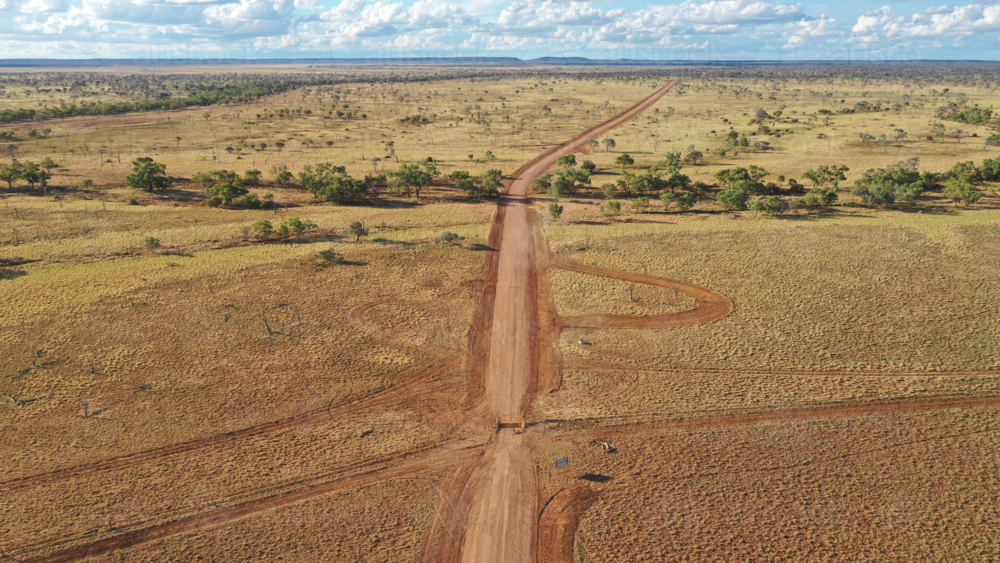 Drone shot of a dirt road post flood repair - Australian Stock Image