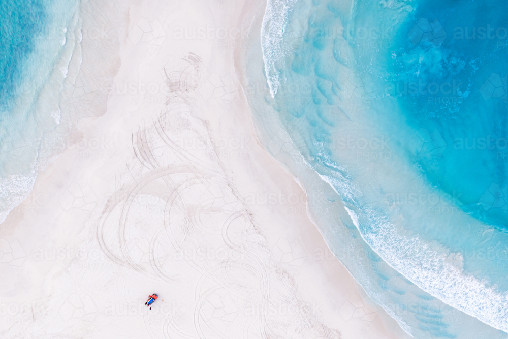 Drone top down view of 4wd on Sandy Beach Esperance - Australian Stock Image