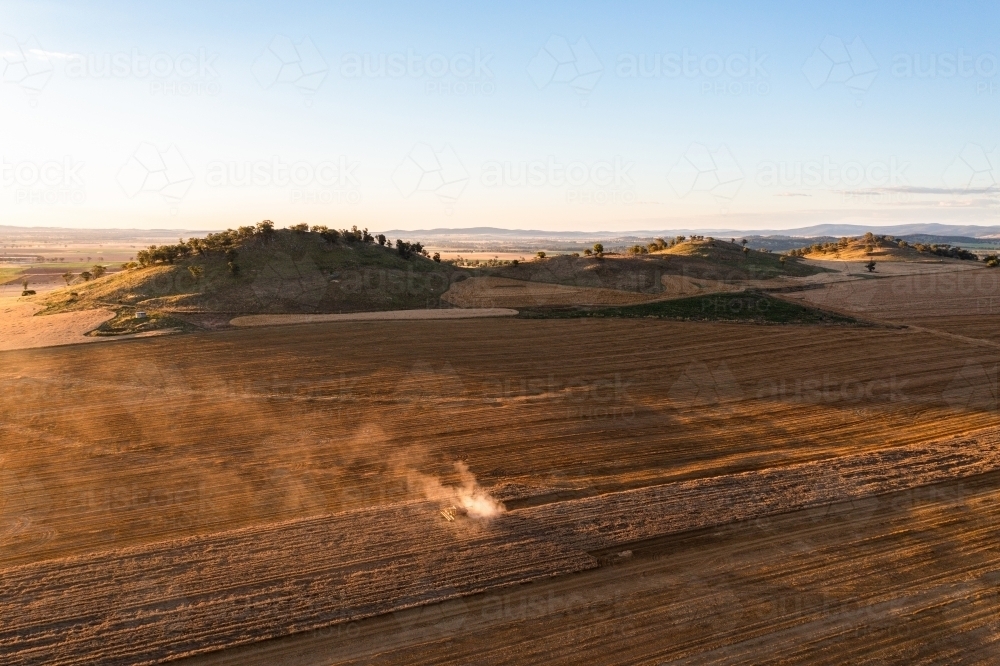 Drone view of combine harvester - Australian Stock Image