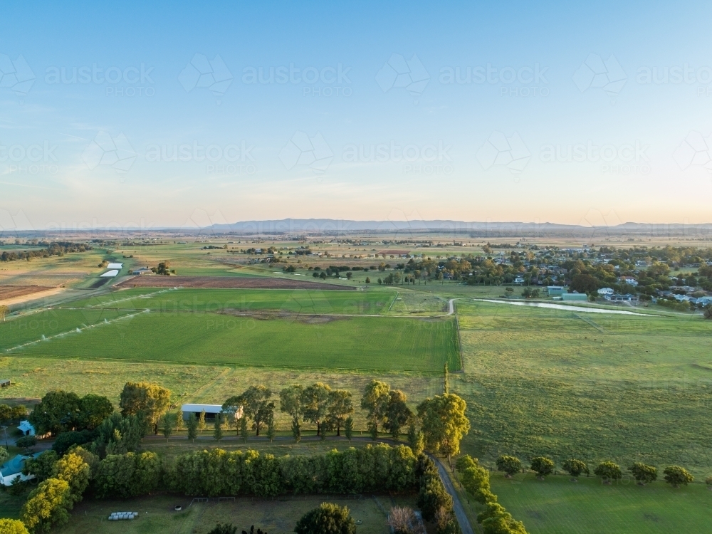 Fram Paddock Image of Drone view of lush green farm paddock with irrigation system ...
