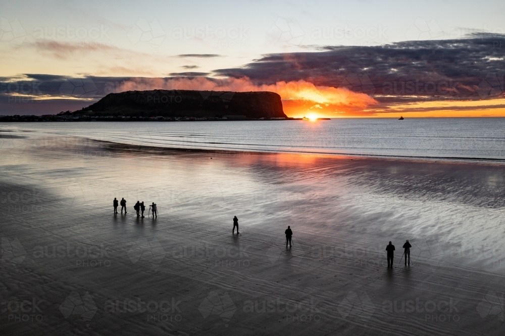 Drone view of photographers capturing sunrise over Nut at Stanley - Australian Stock Image